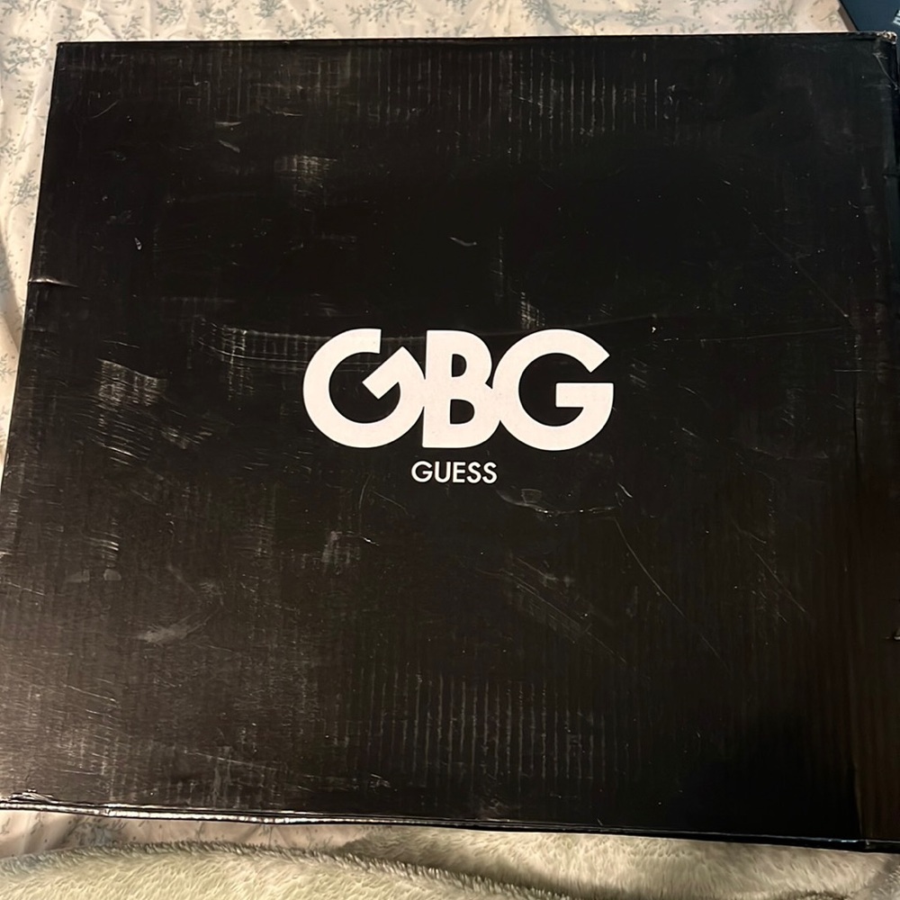 GBG Guess size 6.5  color black and like a copper